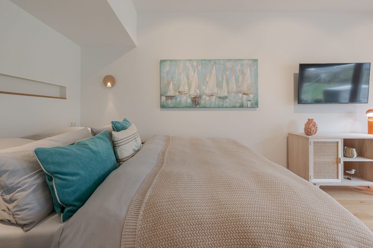 Schlafzimmer öin einer Ferienwohnung auf Sylt