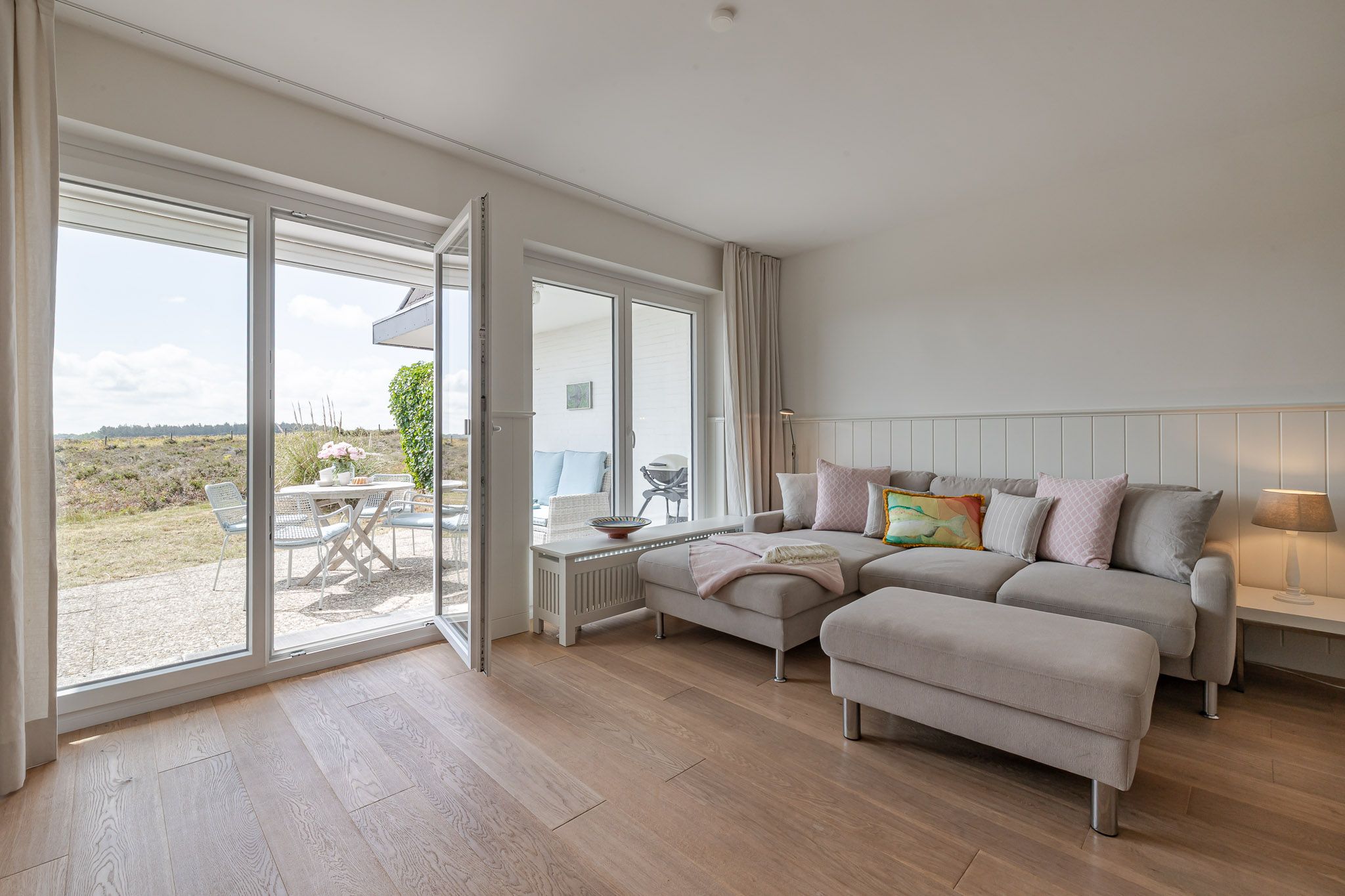 Schöner Wohn mit Terrassenblick in einer Ferienwohnung auf Sylt