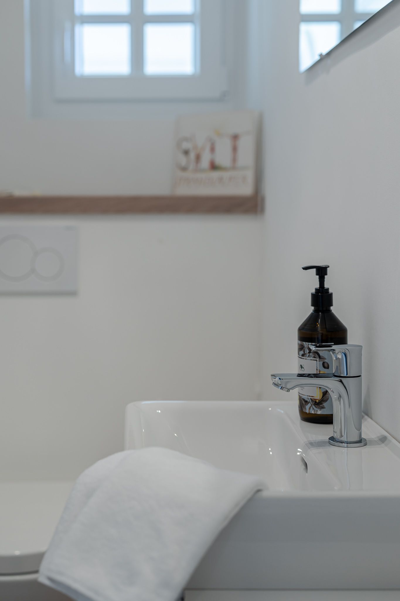 Waschbecken im WC in einer Ferienwohnung auf Sylt