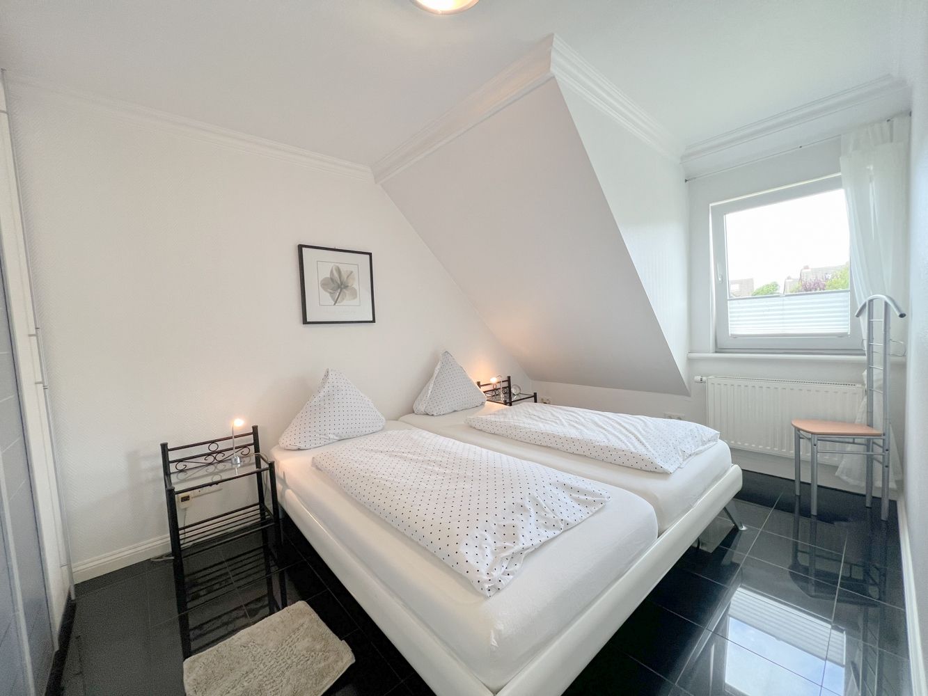 Schlafzimmer in einer Ferienwohnung auf Sylt