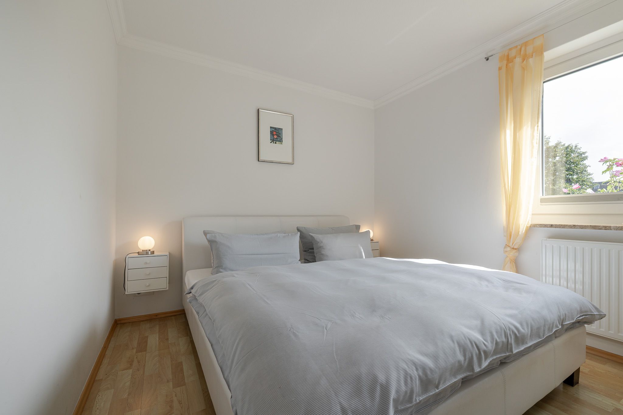Schlafzimmer in einer Ferienwohnung auf Sylt