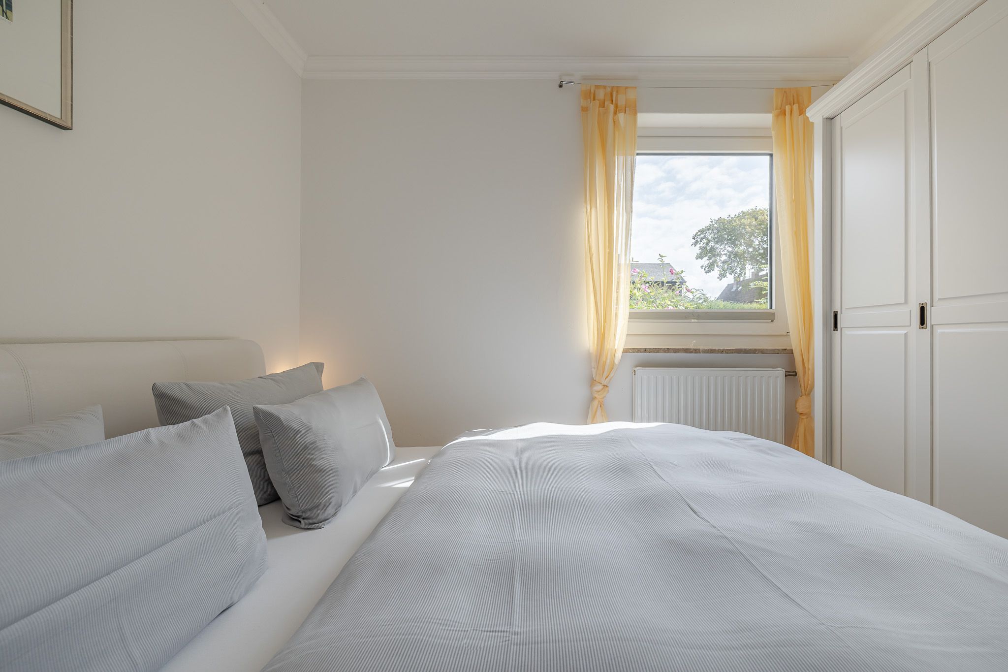 Schlafzimmer in einer Ferienwohnung auf Sylt